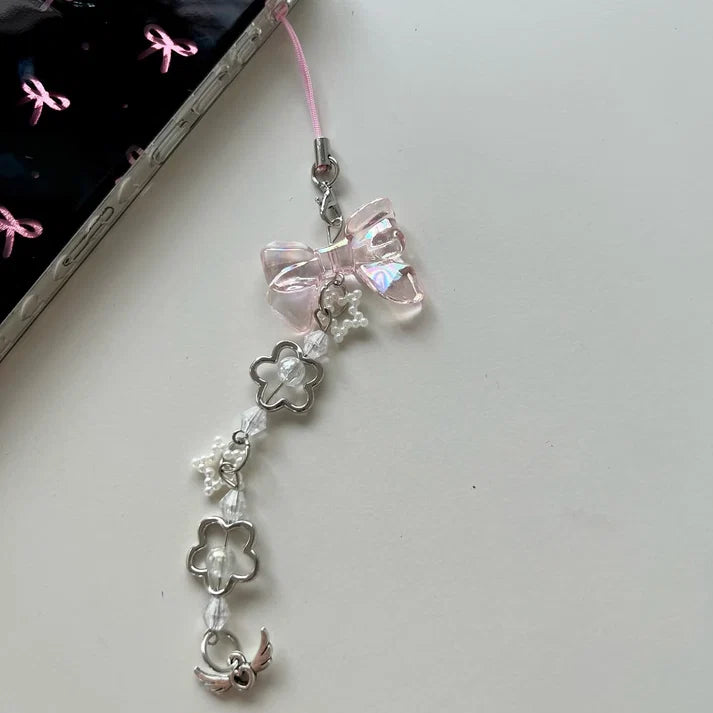 elegant phone case features a glossy black finish with cute pink bow prints with charm
